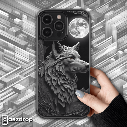 Wolf under the the Moon Phone Case: A striking phone case featuring a detailed wolf with a full moon in the background, designed in grayscale.