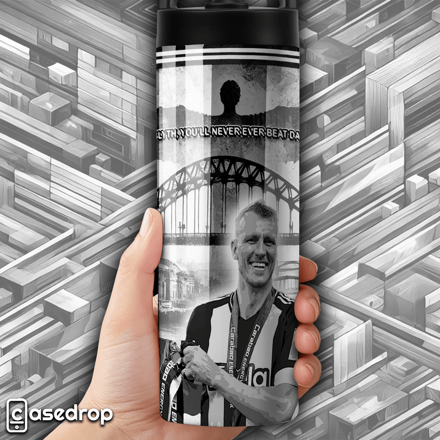 NUFC football tumbler featuring Dan Burn with trophy