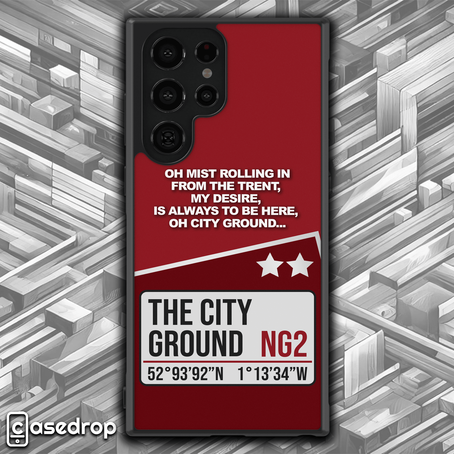 Close-up of Nottingham Forest themed phone case highlighting fine details of the City Ground address and 'the mist goes rolling in' football song lyrics, ideal for dedicated fan