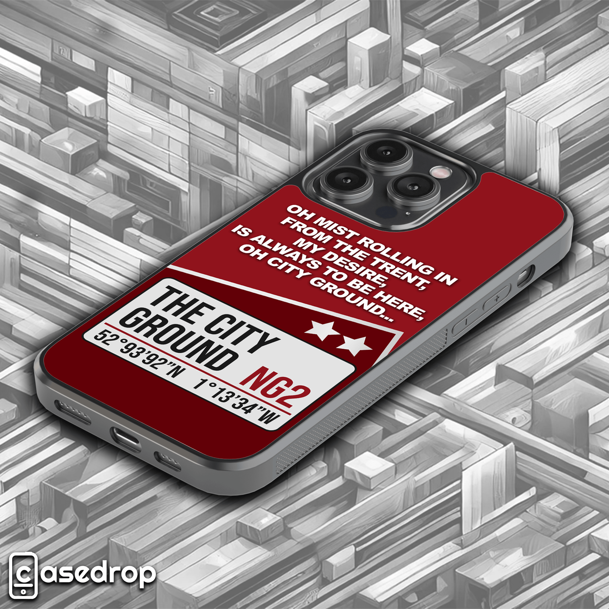 Side angle of Nottingham Forest themed phone case showcasing detailed design with City Ground address and iconic 'the mist goes rolling in' lyrics, perfect for football supporters